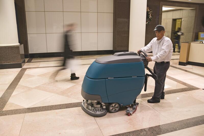 man using a cleaning machine